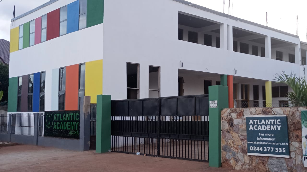 The distinctive Atlantic Academy school building in Ogbojo, Accra